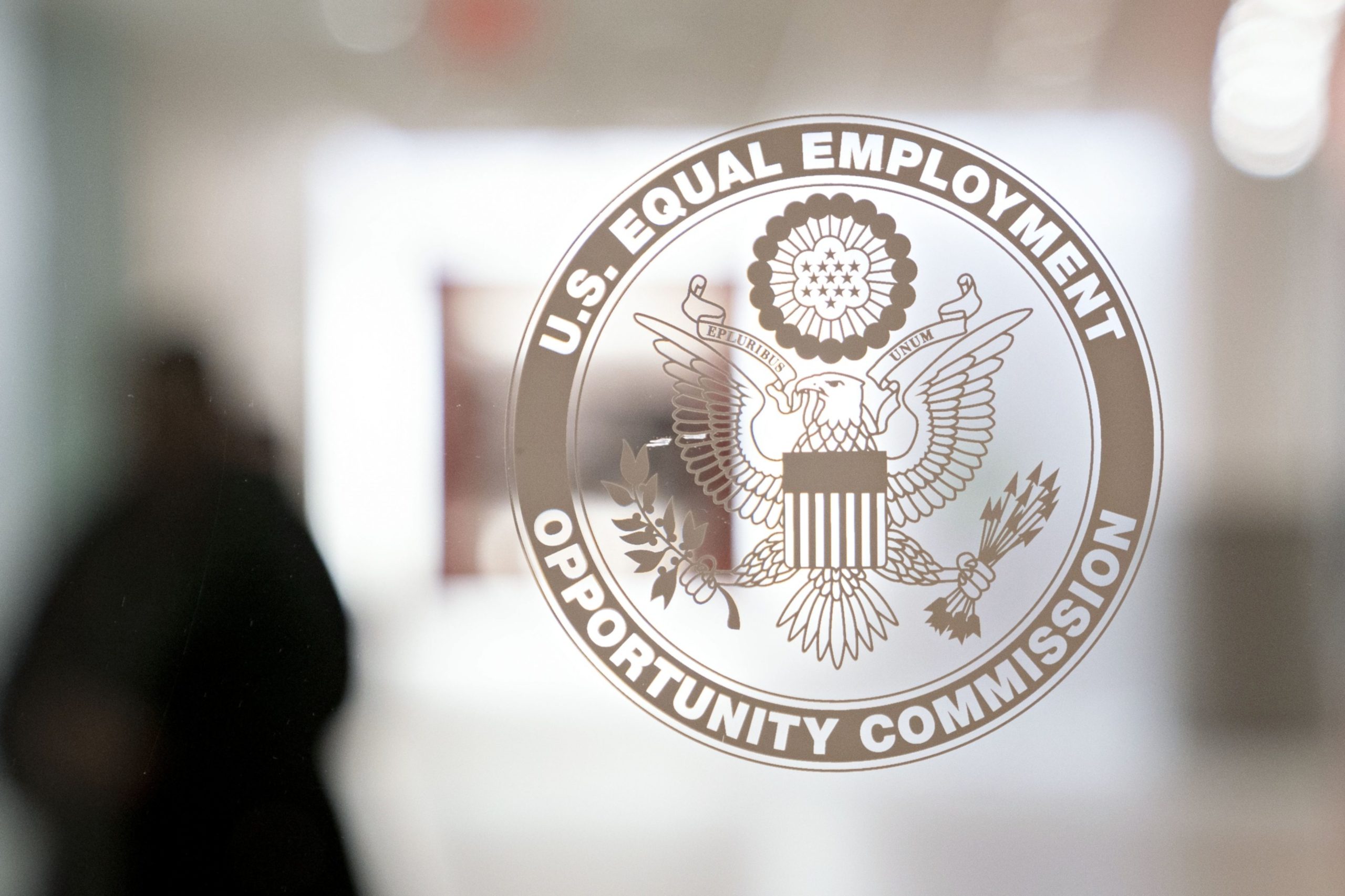 The Equal Employment Opportunity Commission (EEOC) seal is displayed on a window at the headquarters in Washington, D.C., U.S.